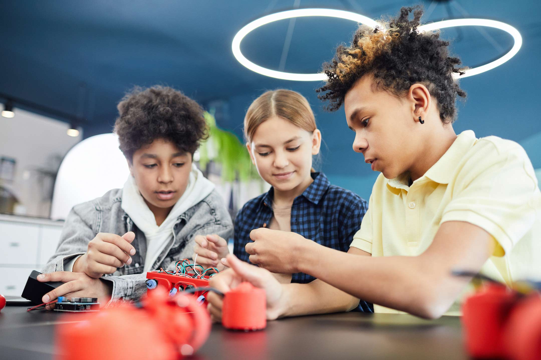 Children working on electronics